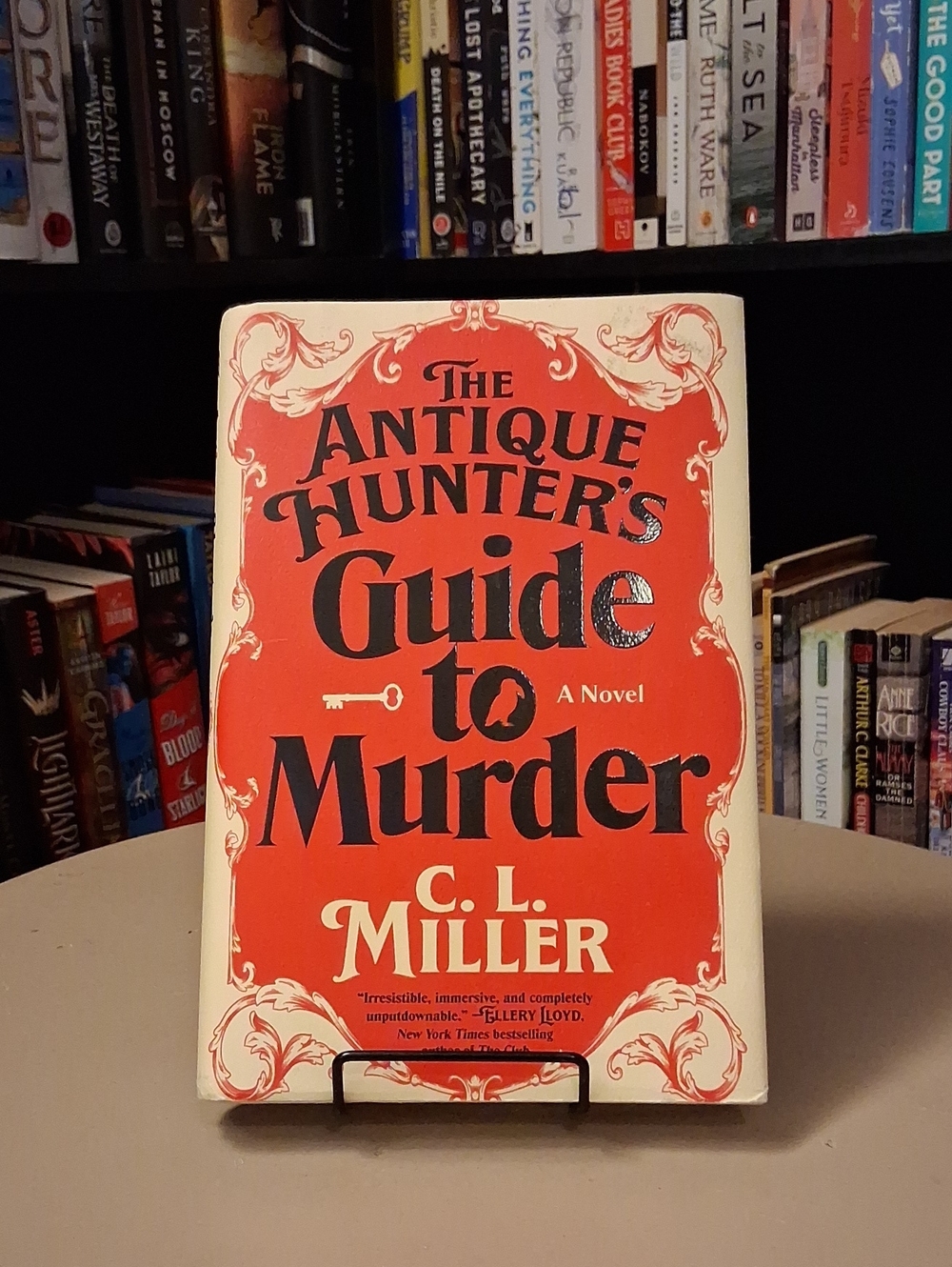The Antique Hunter's Guide to Murder by C. L. Miller